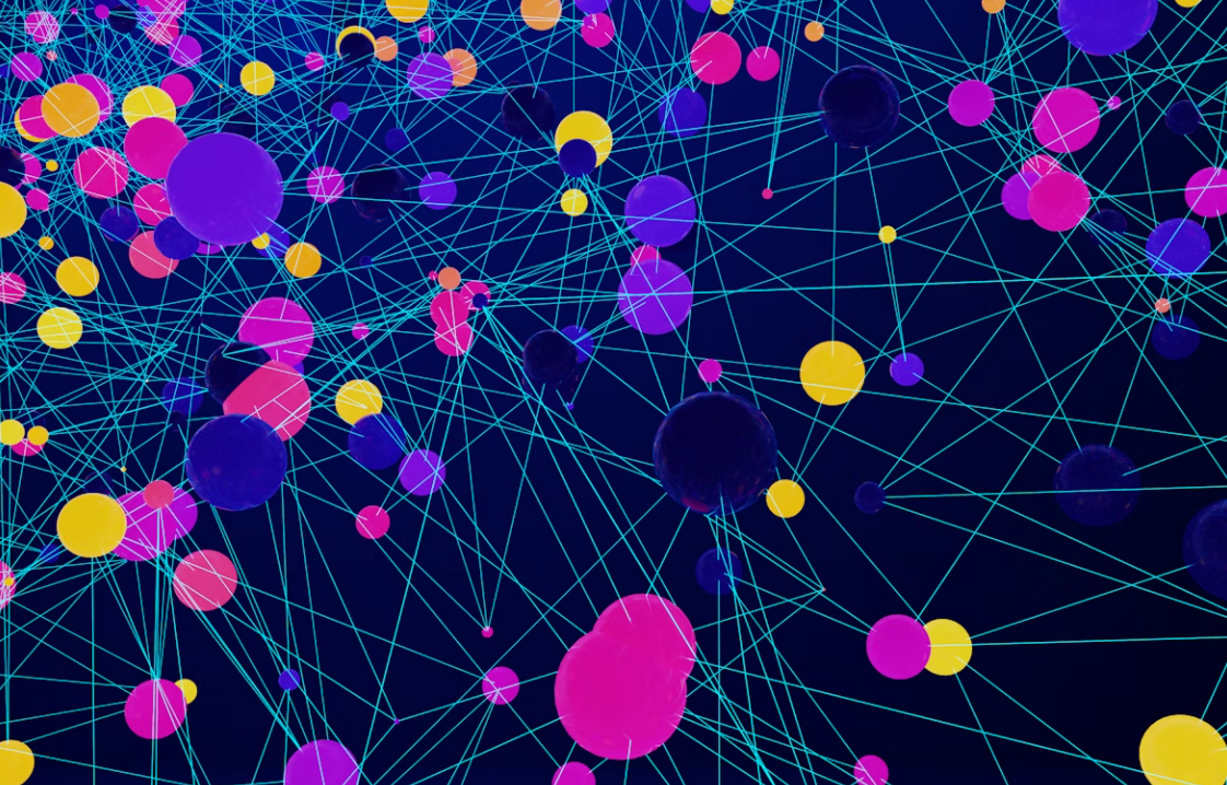 Multi- coloured circles connected by light blue lines on a dark blue background