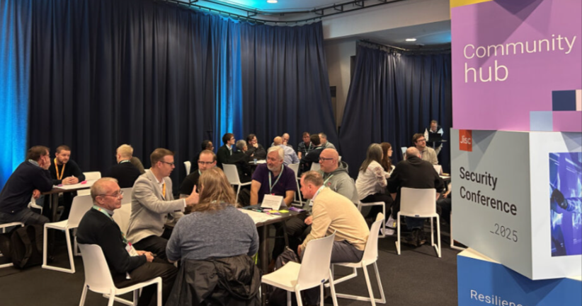 Delegates from the security conference in conversation around tables